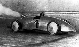 Image 40A Stanley Steamer racecar in 1903. In 1906, a similar Stanley Rocket set the world land speed record at 205.5 km/h (127.7 mph) at Daytona Beach Road Course. (from History of the automobile)