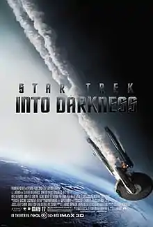 The poster shows the USS Enterprise falling towards Earth with smoke coming out of it. The middle of the poster shows the title written in dark gray letters, and the film's credits and the release date are shown at the bottom of the poster.