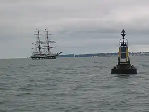 The 'East Bramble' East Cardinal Mark helps the Stavros S Niarchos navigate safely in the Solent, August 2008