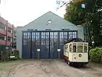 Historic tramcar 16, dating from 1925, standing on the depot fan in front of the depot.