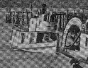 Mizpah approaching dock in Olympia, circa 1911, with sternwheel of S.G. Simpson visible on right