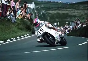 Steve Hislop riding the rotary-engined Norton RCW 588 at the Creg-ny-Baa in 1992, with the white building of Kate's Cottage visible in background