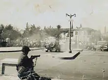 Image 26A British soldier facing a crowd of Greek Cypriot demonstrators in Nicosia (1956) (from Cyprus)