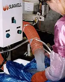 Pumping slurry ice onto fresh fish