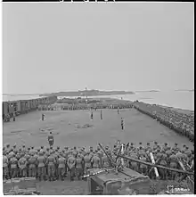 Soldiers standing in a square formation