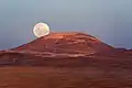 Supermoon rising up from behind Cerro Armazones.