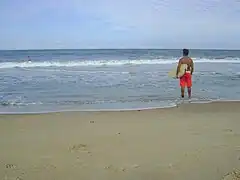 Surfer in a local beach