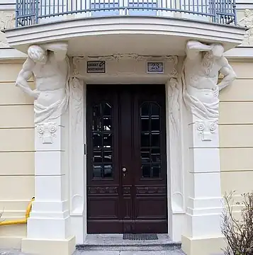 View of the entrance portal with atlases