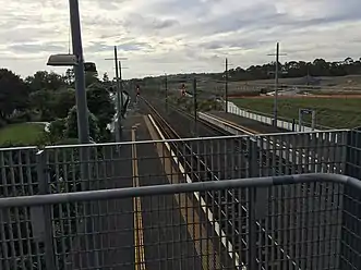 The platforms as well as tracks leading into the station. Photo faces east.