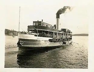 At Manly Wharf in 1951 as a steamer, showing the rebuild in the 1940s and full extension of her wheelhouses.