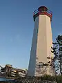 The Sylvan Lake Lighthouse with the waterslides in the background.