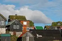 Image 11Traditional Faroese houses with turf roof in Reyni, Tórshavn. Most people build larger houses now and with other types of roofs, but the turf roof is still popular in some places. (from Culture of the Faroe Islands)