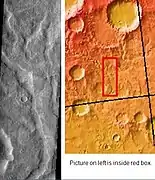 Tader Valles, as seen by THEMIS.  Smooth material in channels may be a mantle in the form of dirty snow.