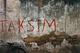 Image 3"TAKSİM" (division) graffiti on a wall in Nicosia in the late 1950s (from Cyprus problem)