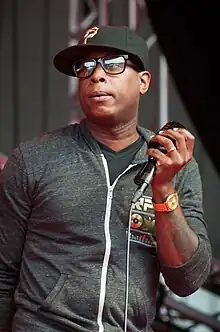 Kweli performing in 2012