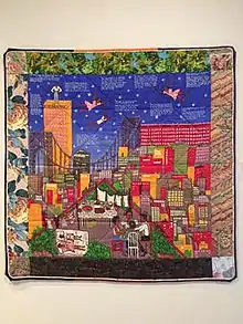 Tar Beach 2 (1990), by Ringgold. This painted story quilt tells the story of Cassie Louise Lightfoot, an eight-year-old girl who dreams of flying over her family's Harlem apartment building and throughout the rest of New York City. Photo taken at the Delaware Art Museum in 2017.