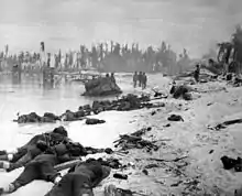 Image 62Bodies of U.S. Marines on the beach of Tarawa. The Marines secured the island after 76 hours of intense fighting. Over 1,000 American and ~4600 Japanese troops died in the fighting. (from World War II casualties)