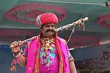 A man in traditional costumes during Tarnetar fair