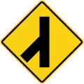 Skewed side road junction on left