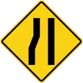 Road narrows .on left side