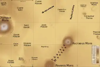 Map of Tharsis quadrangle with major features indicated.  Tharsis contains many volcanoes, including Olympus Mons, the tallest known volcano in the Solar System. Ceraunius Tholus, although it looks small, is about as high as Earth's Mount Everest. The locations of some fossae are shown.