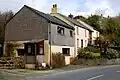 Looking uphill from the River Camel at the Old Mill beside the B3314.