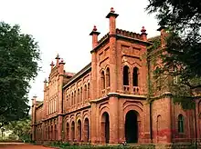 Red coloured two floored historic college building