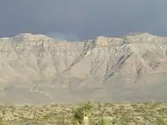 Cliffs, and foothills with Joshua Trees