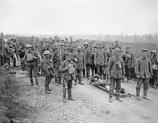 German prisoners guarded by British soldiers of the 58th Division at Sailly Laurette, 8 August 1918.