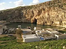 A photograph of the Inland Sea in 2016. Photo shows the arch in the rock.