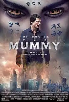 The poster features skyscrapers stuck in a blizzard, in the center. Upon which Tom Cruise appears, whose face is looking somewhere else, concerned. Behind him, face of Egyptian Princess appears, spread upon whole top-half portion. The princess has two irises in each eye, which appears like she got four eyes. Above all these, in the center, title: THE MUMMY, appears.