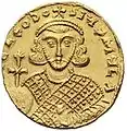 A solidus of Emperor Theodosius III (r. 715–717) holding a globus cruciger surmounted by a patriarchal cross.