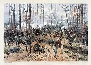 Soldiers fighting in a smoky woods