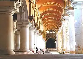 Pillared halls of a historic building.