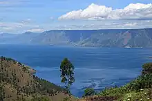 Image 51Lake Toba, the world largest volcanic lake panoramic view seen from Merek, North Sumatra (from Tourism in Indonesia)