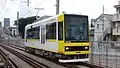 Car 8908 in yellow livery in August 2016