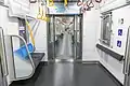 Priority seating interior view of the Tokyo Metro 17000 series, featuring a wheelchair space