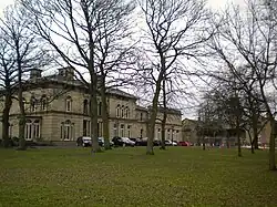 Victorian Mansion seen through winter trees