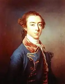 Half-length portrait of a young man wearing a blue coat