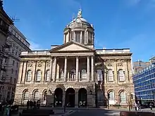 South front, Liverpool Town Hall(1749–54; Grade I), the portico is dated 1811 and the dome 1802.