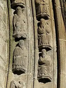 The voussoirs decorating the arch of the "porche des cloches".