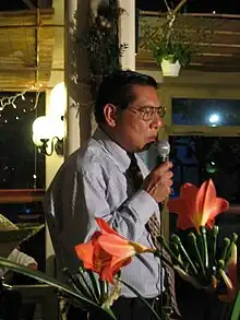 Tran Bich San speaking in Paris, France.