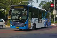 TransJakarta articulated buses at Harmoni Central Busway