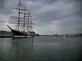 River Trave with the tall sailing ship Passat and the town skyline