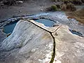 Deposits of several thousand years of calc sinter (travertine) in the Bridgeport, California Hot Springs