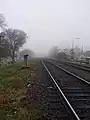 The rail lines of the Railway General Roca, photographed during a clouding morning.