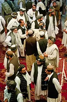 Men wearing perahan tunban in the southern city of Kandahar