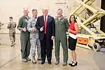 President Donald J. Trump poses for a photo with Brig. Gen. Todd Canterbury, Chief Master Sgt. Ronald Thompson, Col. Bryan Cook and U.S. Rep. Martha McSally, R-Ariz. after participating in a defense capability tour Friday, Oct. 19, 2018, at Luke Air Force Base, Ariz.