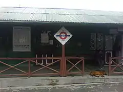 Station with a corrugated-metal roof