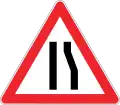 Road narrows on right side